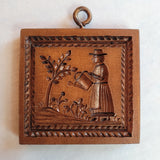 woman watering plants gardener springerle cookie mold