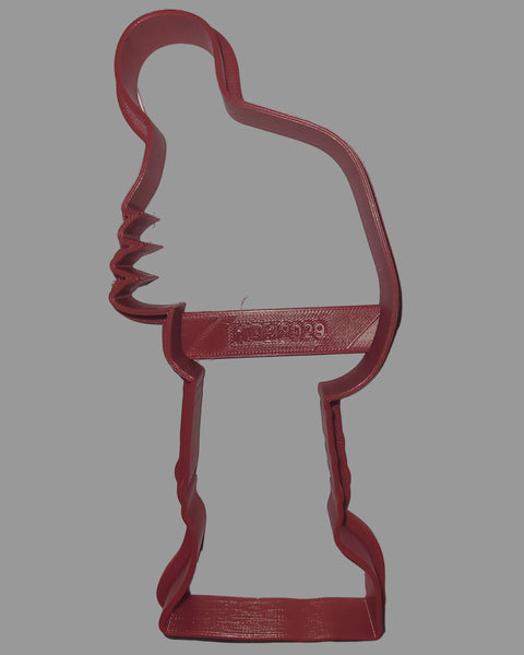 Santa holding Christmas tree with star cookie cutter