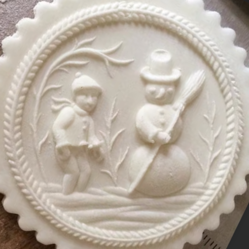 boy with snow man springerle cookie mold house on the hill