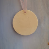 back of ammonite ornament