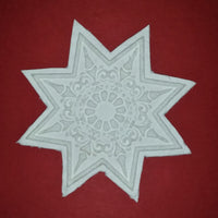 paper cast from eight point ornamental star springerle mold